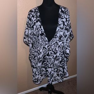 Black and white sheer swim cover.